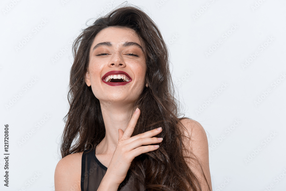 portrait of a beautiful happy woman looking into camera portrait of a beautiful happy woman looking into camera