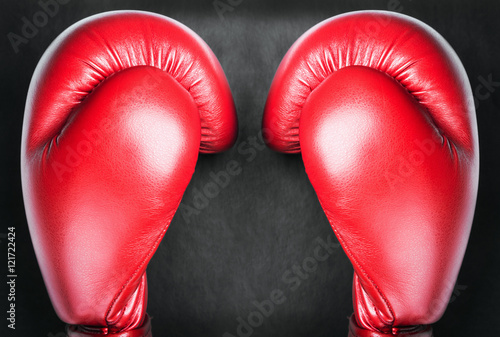 red leather boxing gloves  © OlegDoroshin