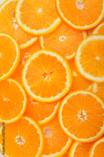 citrus background. juicy slices of orange cover the entire surface