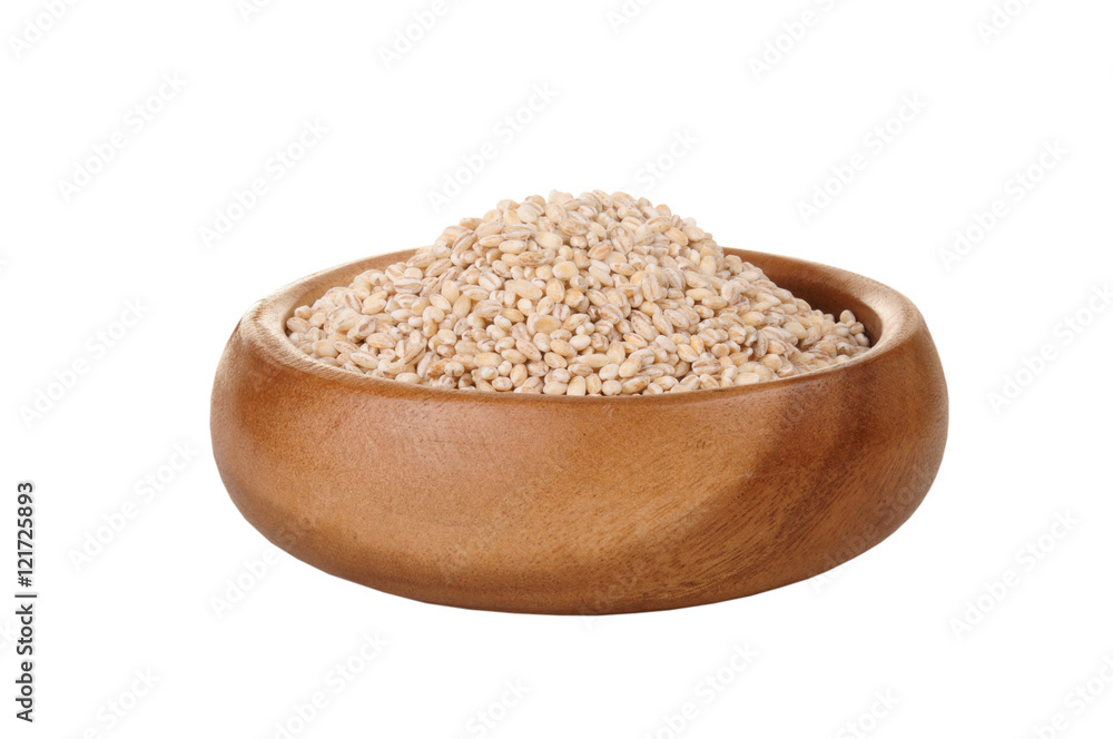 pearl barley in a wooden bowl. for healthy cooking ingredient pearl barley in a wooden bowl. for healthy cooking ingredient