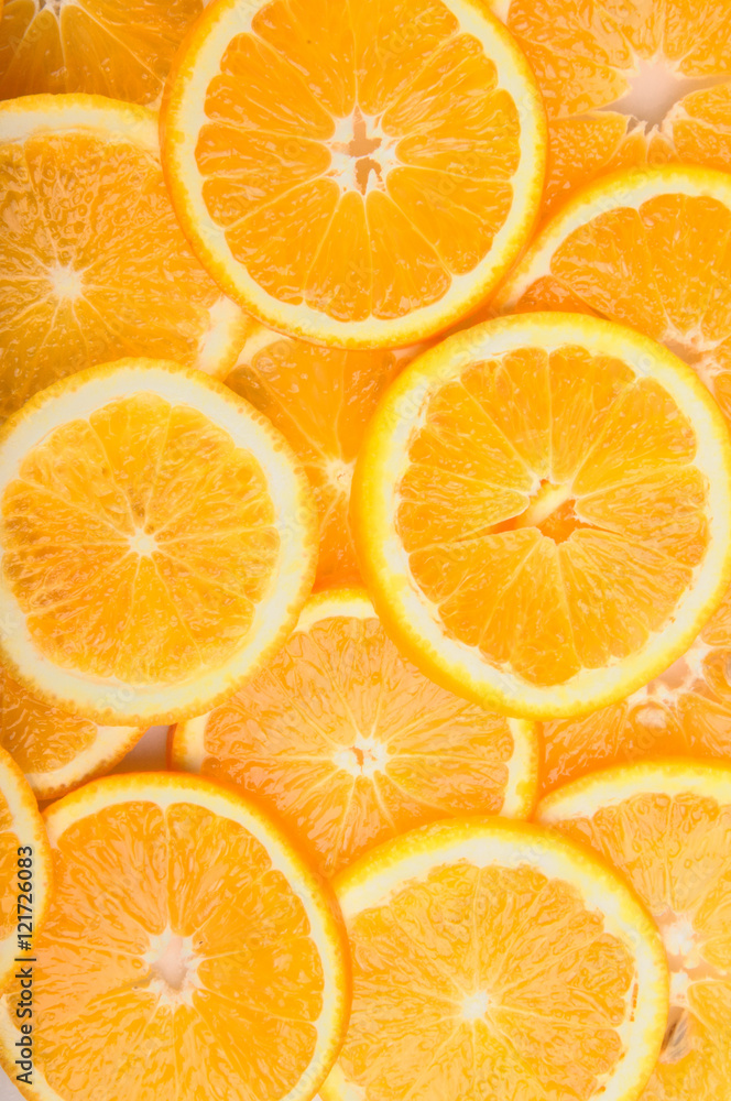 citrus background. juicy slices of orange cover the entire surface. citrus background. juicy slices of orange cover the entire surface.