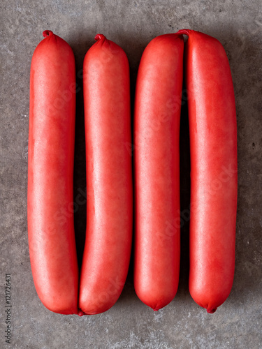 rustic english saveloy red pork sausage photo