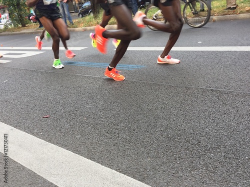 Fototapeta Naklejka Na Ścianę i Meble -  Berlin, Germany - September 25, 2016: marathon runners legs