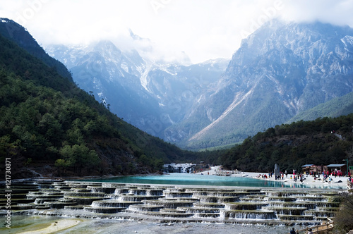 White Water River (Baishui River) with Jade Dragon Snow Mountain background in Blue Moon Valley of Lijiang located at Yunnan, China.