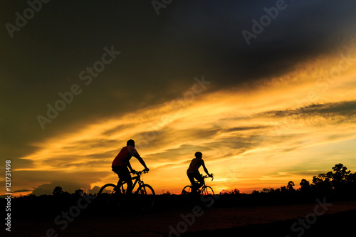 silhouette of people riding bicycle for health