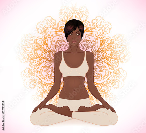 Beautiful African American Girl sitting in Lotus pose with ornat