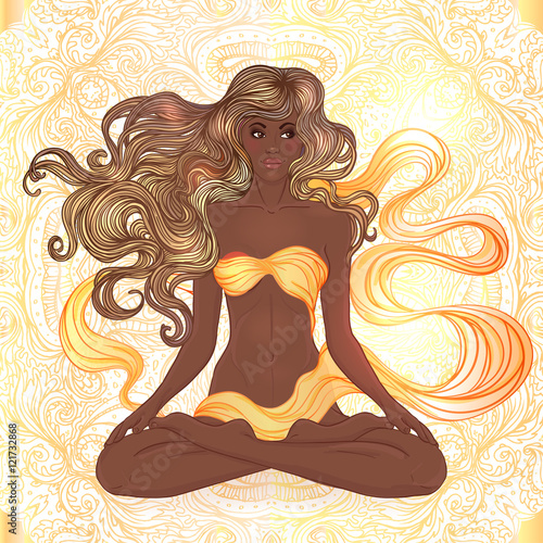 Beautiful African American Girl sitting in Lotus pose with ornat