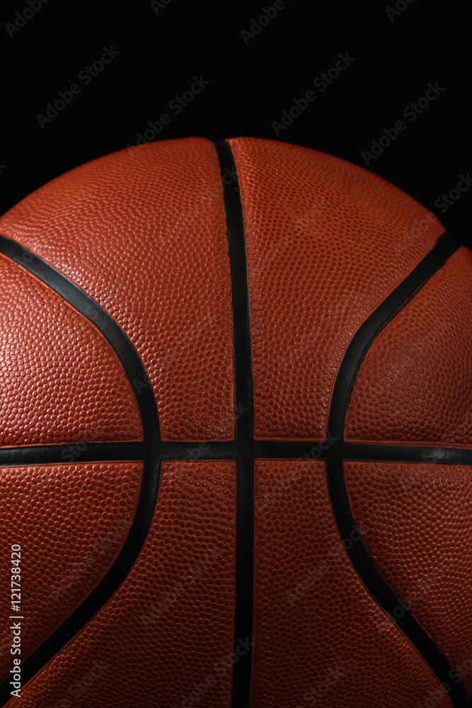 Fototapeta premium Basketball on a black background