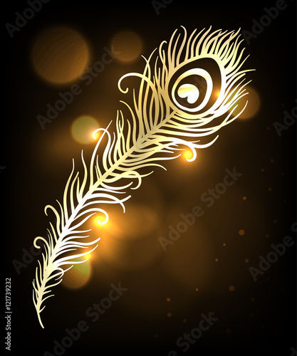 Shiny gold feather over dark background. Concept for temporary tattoo
