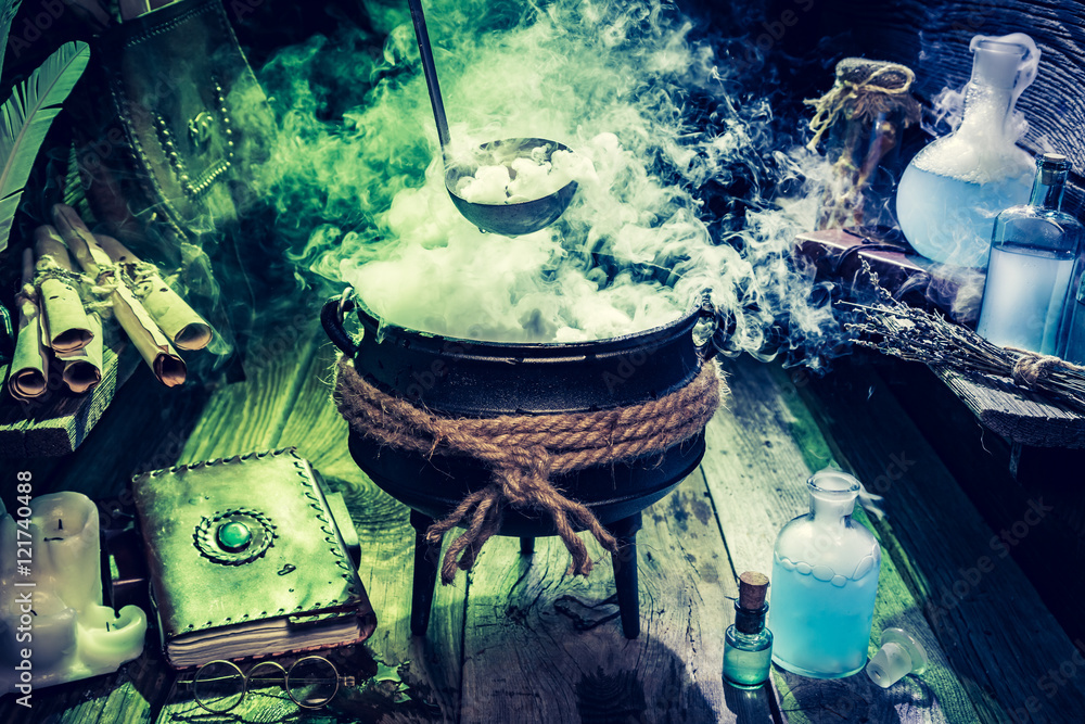 Naklejka premium Mysterious witch pot with blue potions and books for Halloween