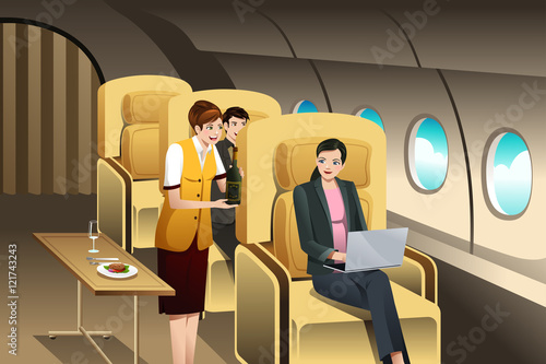 First Class Passengers Being Served by the Flight Attendant