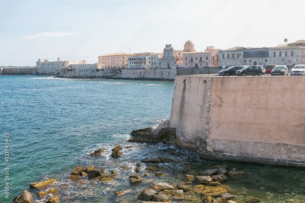 Coast of Ortigia island at city of Syracuse, Sicily, Italy