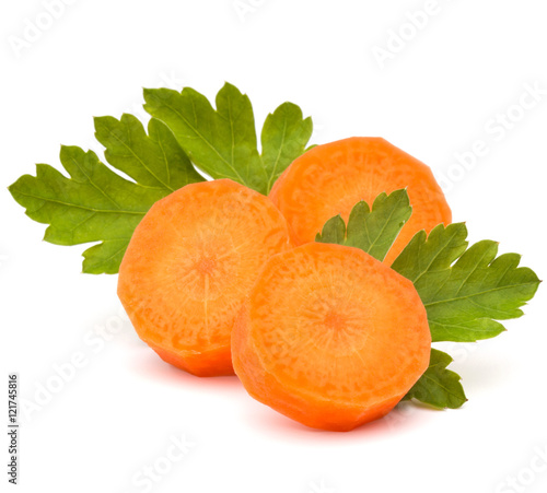 Chopped carrot slices and parsley herb leaves still life isolate