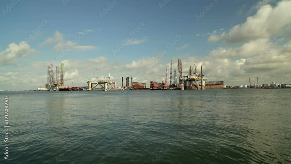 Drilling platforms and rigs for the oil and gas industry in for repairs in Galveston harbor. Drilling platforms and rigs for the oil and gas industry in for repairs in Galveston harbor.
