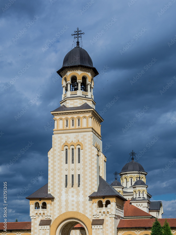 Bell tower of Coronation Cathedral deticated to Holy Trinity in Citadel of Alba Iulia city in Romania
