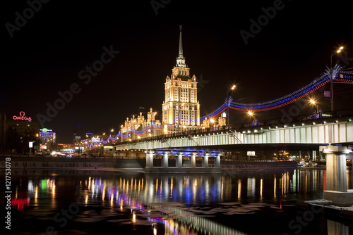 View of the hotel Ukraine, Novoarbatsky bridge, Moscow river at night, Moscow, Russia