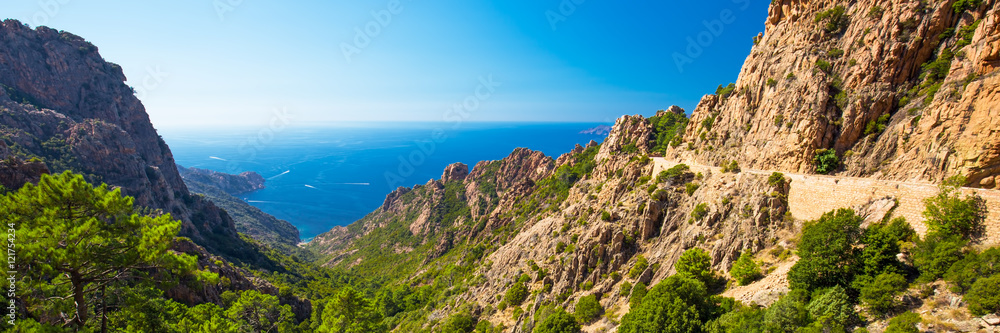 Stunning scenery of D81 road through the Calanches de Piana on the west coast of Corsica, France, Europe.