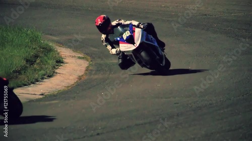 Motorcycle racing HD slow motion static video. Moto riders in turn on circuit road track. Extreme sport concept
