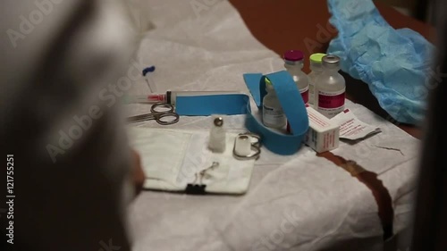 Doctor Preparing IV for Patient