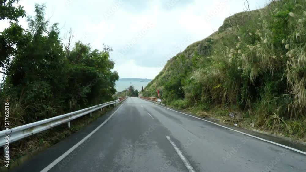 Downhill POV through the coastal hills of Okinawa. Downhill POV through the coastal hills of Okinawa.