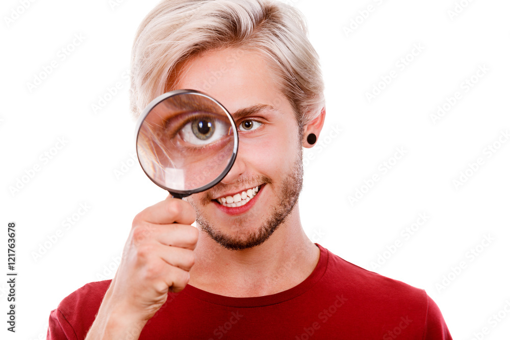 man holds on eye magnifying glass looking through loupe man holds on eye magnifying glass looking through loupe