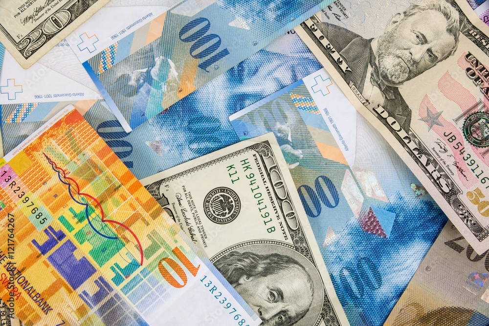 Fototapeta premium USD and CHF banknotes as background