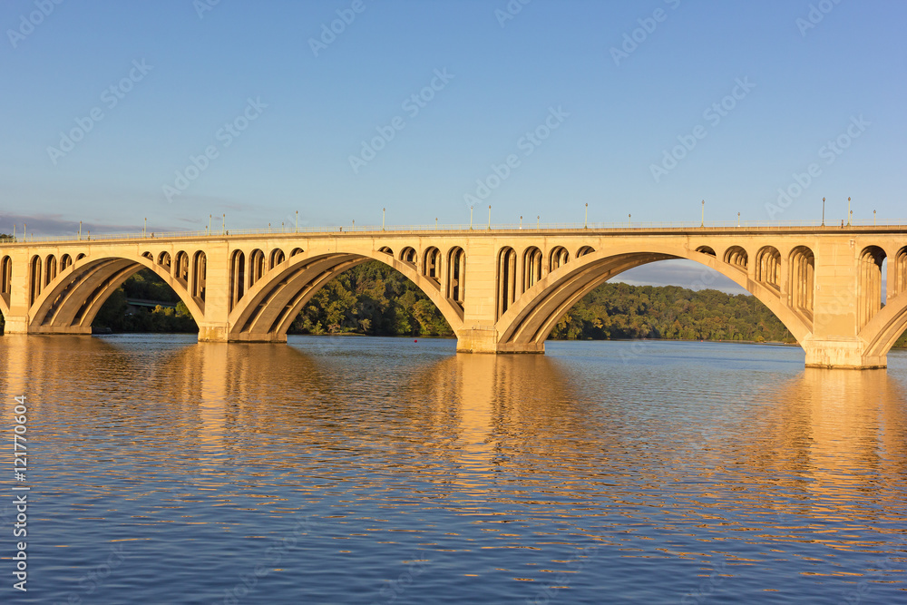 A sunrise over Key Bridge in Washington DC. A view on Key Bridge over Potomac River from the District of Columbia, USA.