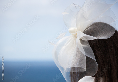 Wedding fascinator overlooking the sea photo