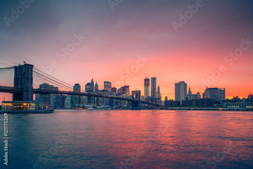 Brooklyn bridge and Manhattan at sunset, New York City © sborisov