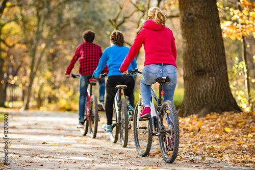 Healthy lifestyle - people riding bicycles in city park  © Jacek Chabraszewski