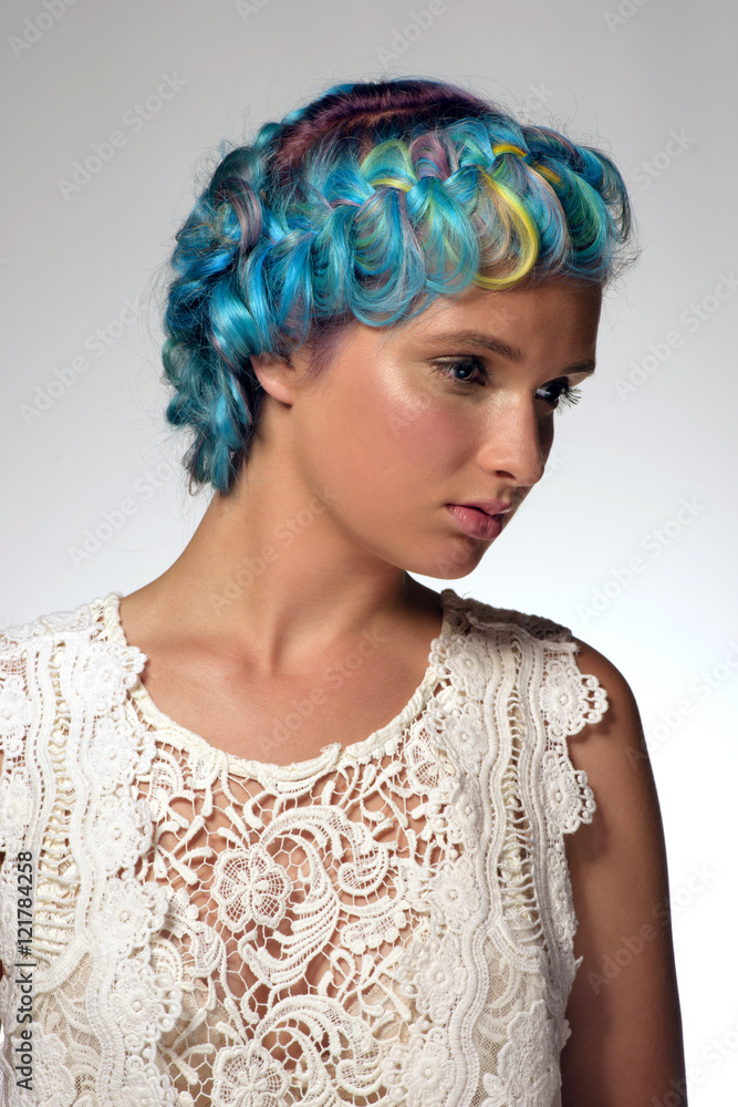 Fototapeta premium Portrait of a tender girl with dyed hair, professional hair colouring and hairstyle