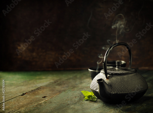 Image of traditional eastern teapot photo