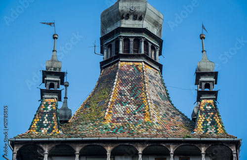 Roof of Famous Clock Tower in Sighisoara town in Romania photo