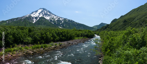 Panoramic view on a river at the foot of Mutnovsky Volcano, Kamchatka, Russia photo