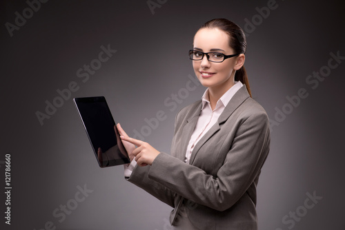 Young businesswoman working with tablet computer