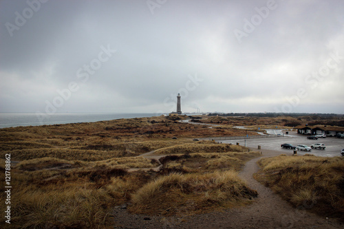 Views of lighthouse on North Sea coast near Skagen, Denmark