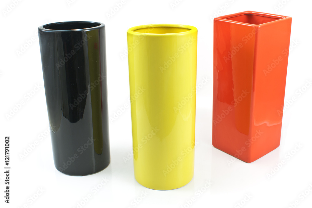 Three colorful ceramic vases isolated on white Three colorful ceramic vases isolated on white