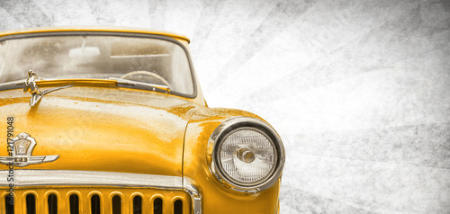 Retro car. Classic USSR GAZ. Photo in vintage style. Beauty round forms. Orange color tones. Background old paper.