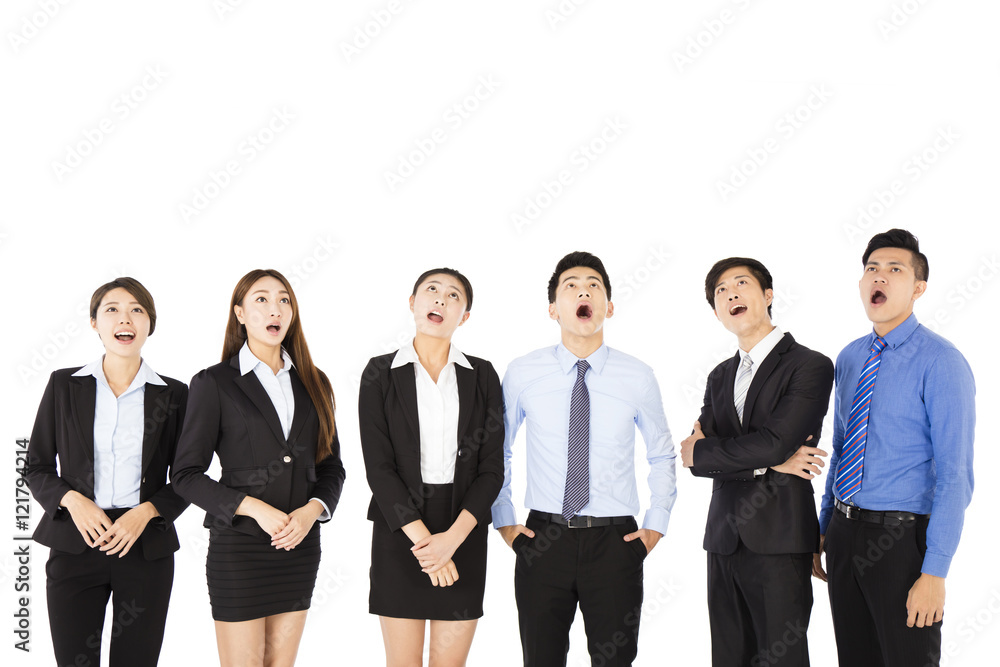surprised and amazed business people looking up surprised and amazed business people looking up