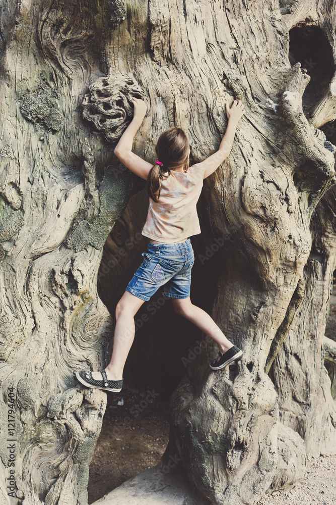 Girl child outdoors climb tree Girl child outdoors climb tree