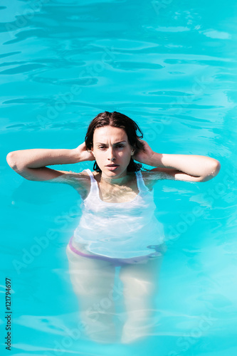 pretty sexy woman in swimming pool © Volodymyr