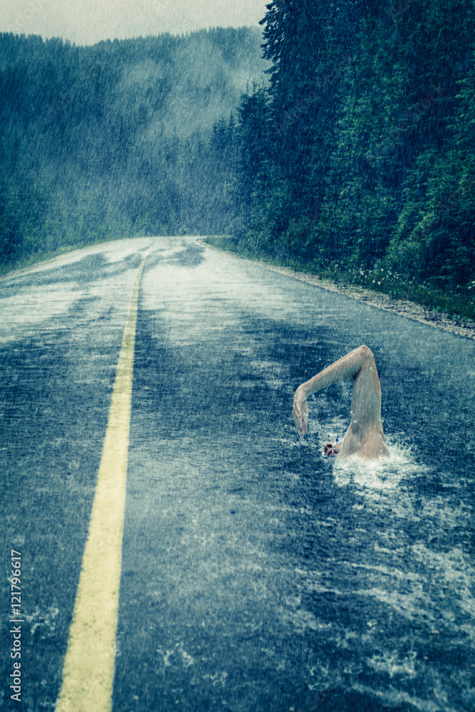 Asphalt swimmer in the rain - obrazy, fototapety, plakaty 