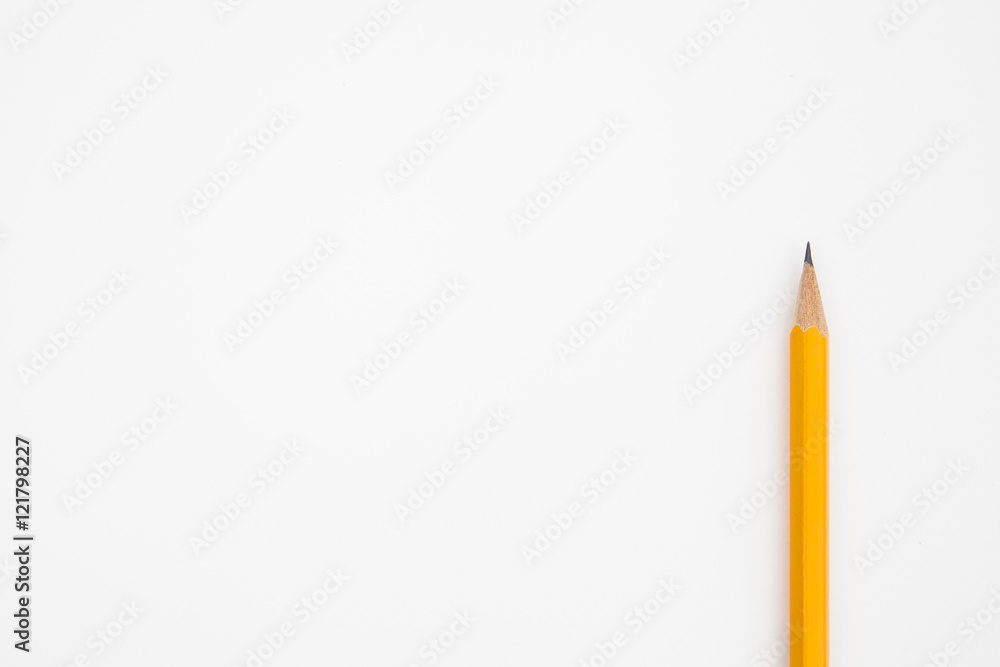 Pencil point close-up on white paper background Pencil point close-up on white paper background