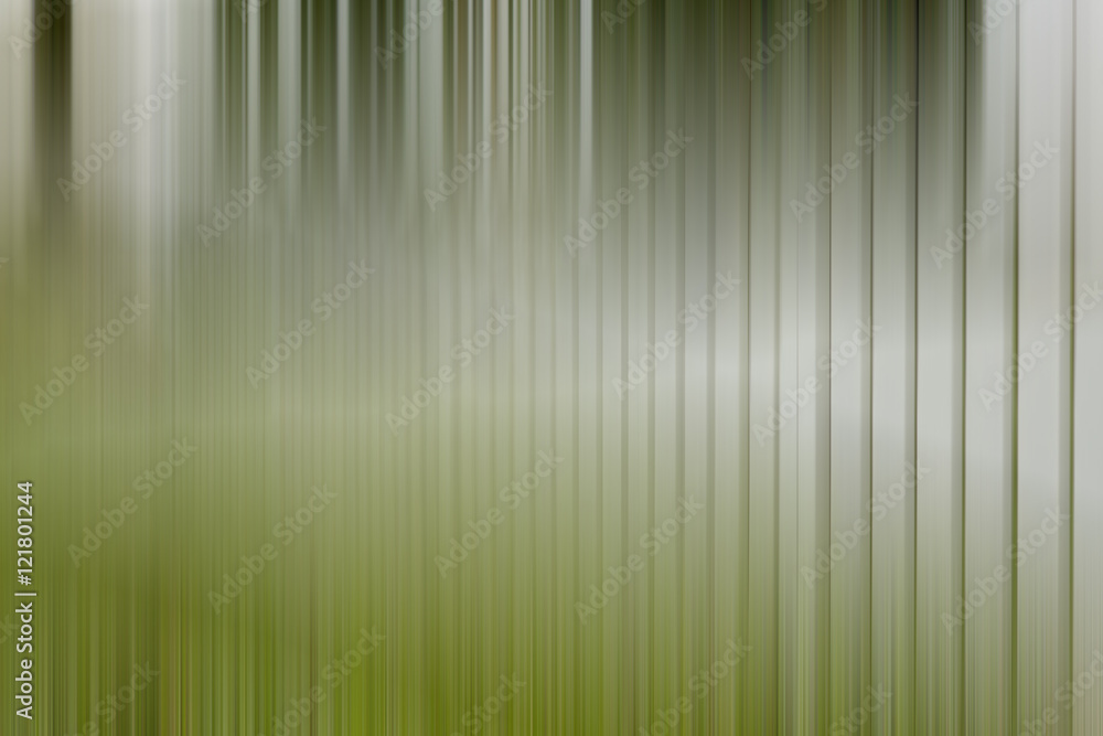 Picket fence with a motion blur effect. Image has a motion blur effect added and tonal correction. Abstract image for example for background use. Picket fence with a motion blur effect. Image has a motion blur effect added and tonal correction. Abstract image for example for background use.