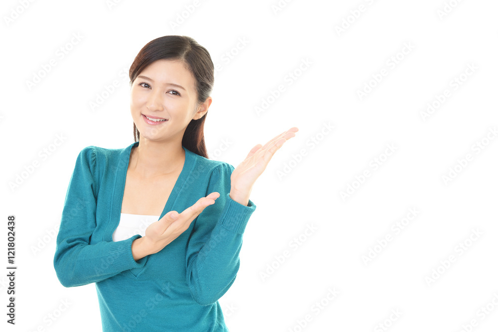 案内する笑顔の女性 案内する笑顔の女性