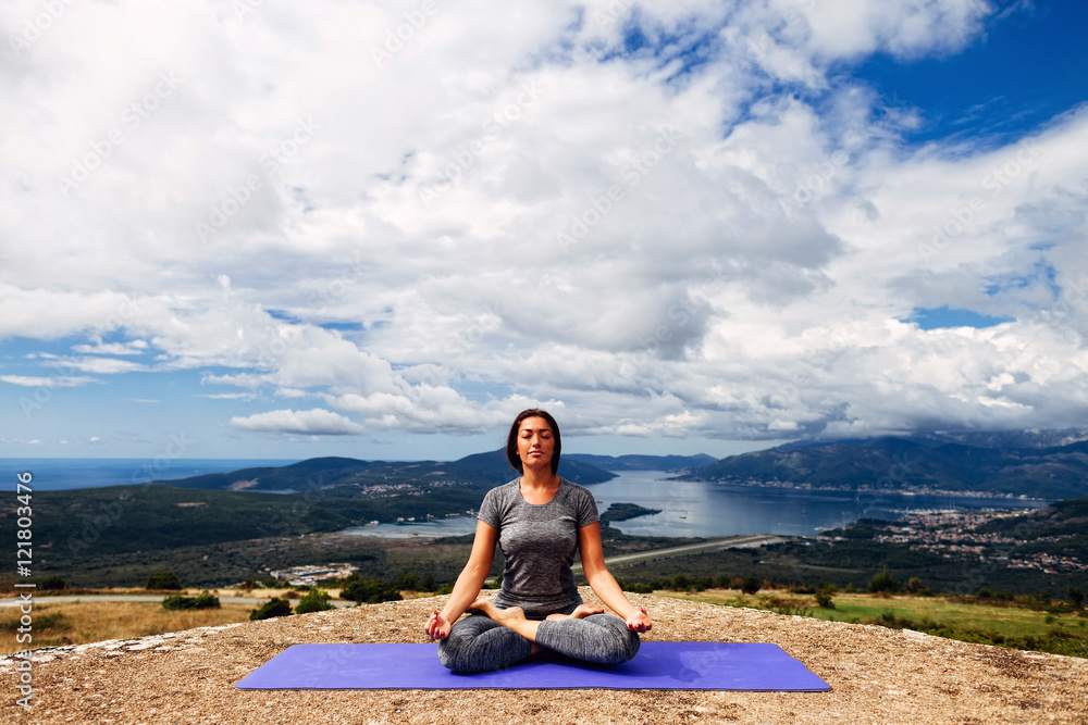 woman yoga relaxation in tranquil landscape
