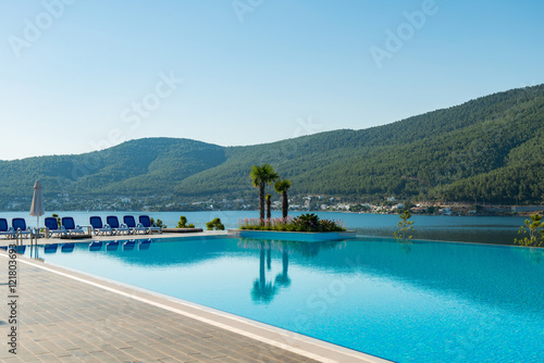 Nice swimming pool outdoors on bright summer day