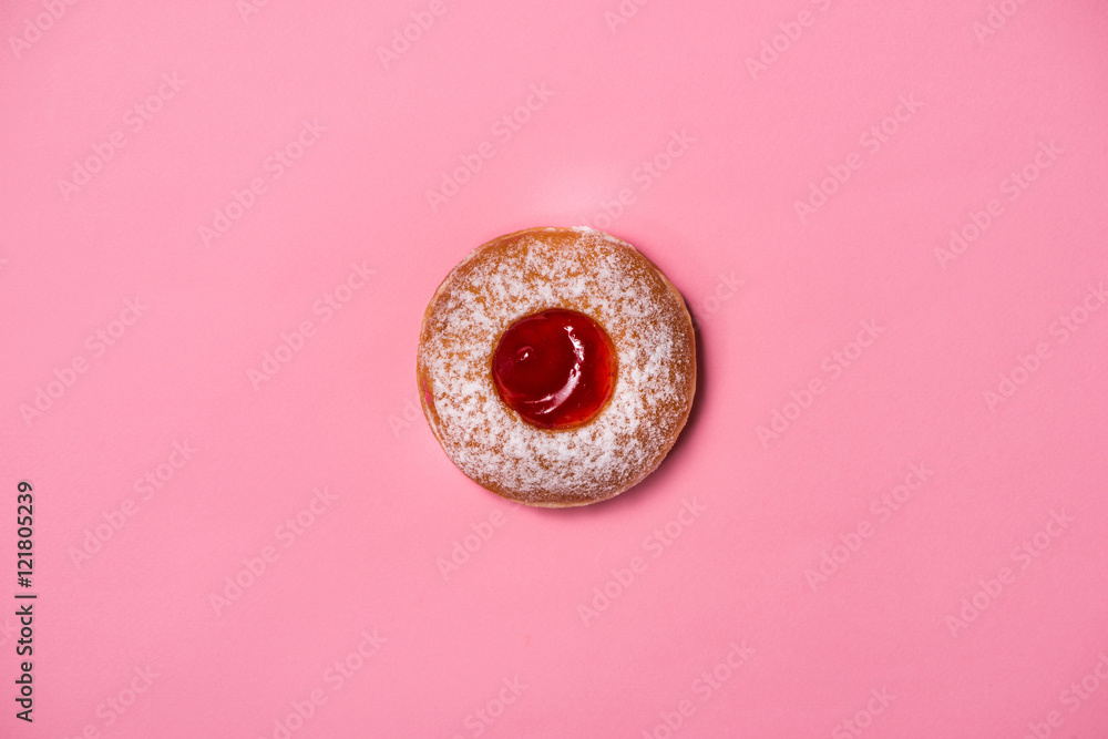 Donuts with icing on pastel pink background. Sweet donuts. Donuts with icing on pastel pink background. Sweet donuts.