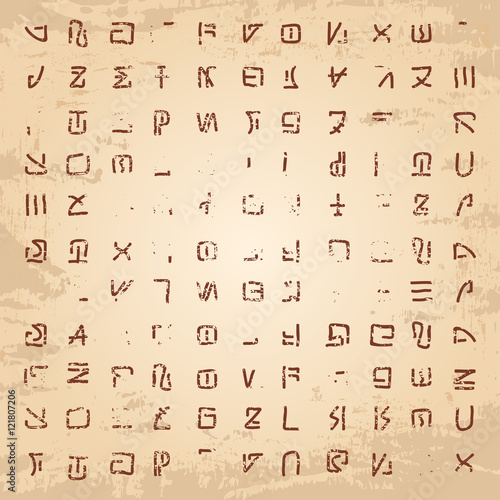 Alien hieroglyphics carved in stone.