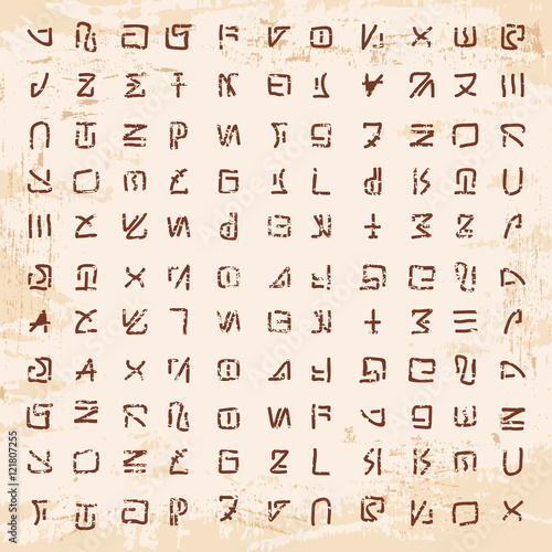 Alien hieroglyphics carved in stone.